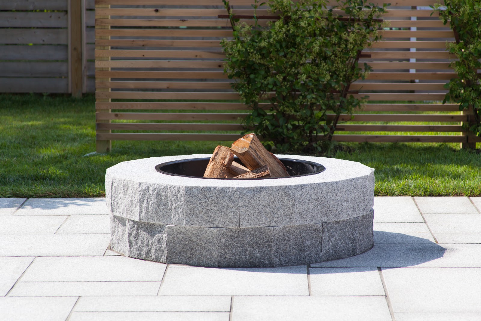 Polycor Hardscapes & Masonry how to install a Woodbury Gray 48” diameter, two-tier fire pit over an existing granite paver patio