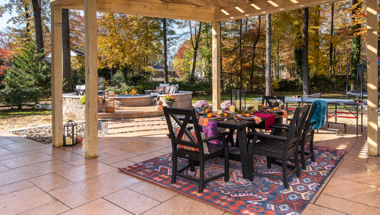 Textures, Colors and Patterns Bring Life to an Expansive Outdoor Living Space Designed with Natural Stone