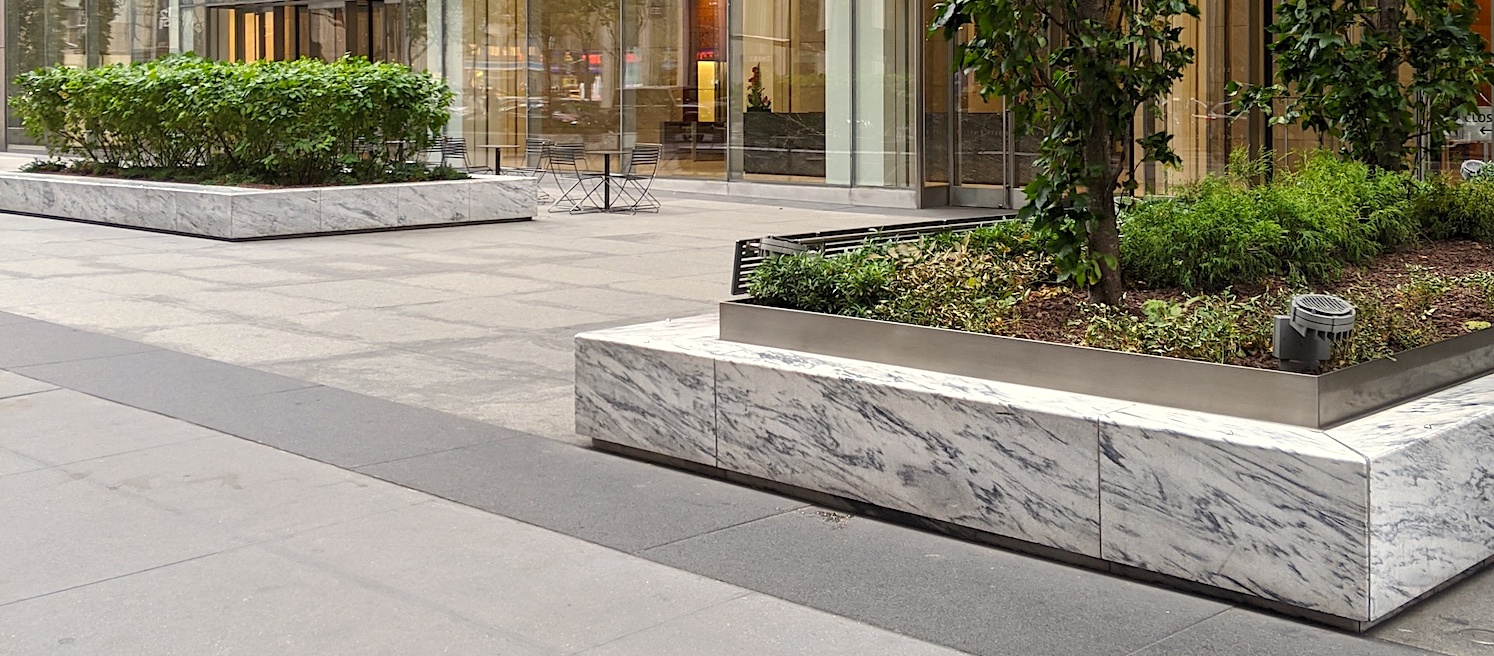 https://www.polycor.com/wp-content/uploads/2023/03/1221-Avenue-of-Americas-Georgia-Marble-Pearl-Grey-Aesthetic-Design-Elements-Featured-2.jpg
