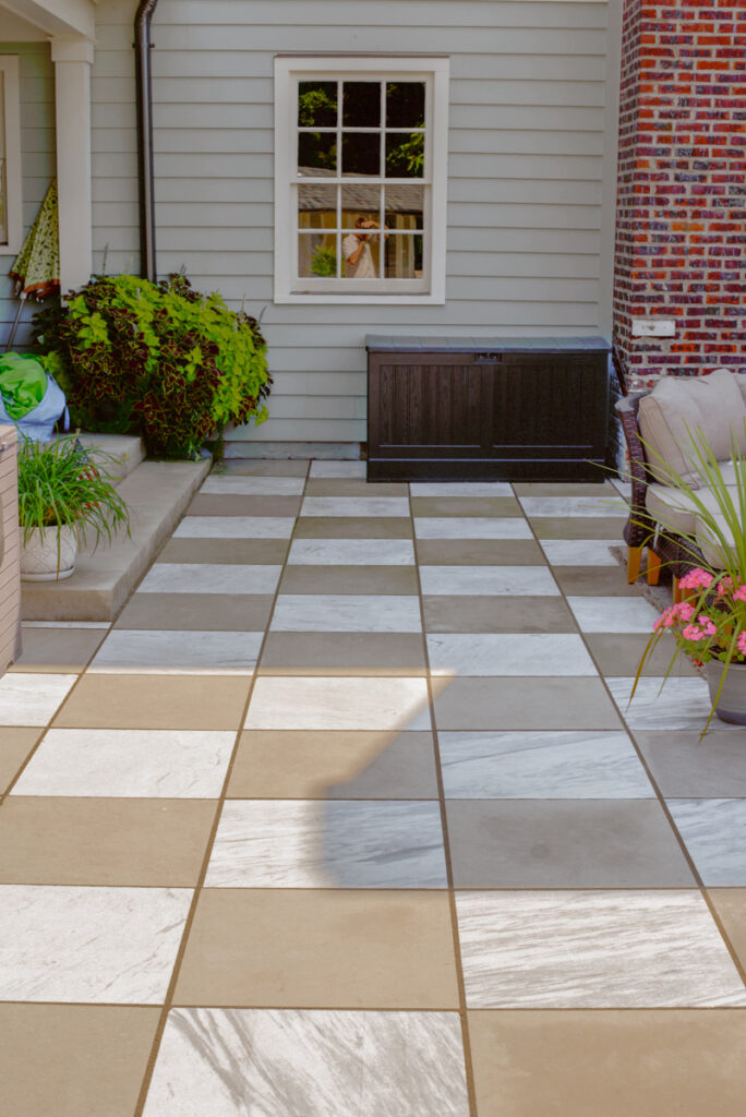 checkerboard patio designed by Jaclyn Isaac using Indiana Limestone and Georgia Marble