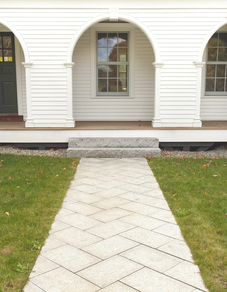 polycor-woodbury-gray-granite-paver-herringbone-pattern-walkway