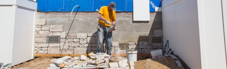 Up Your Curb Appeal: How to Install Thin Stone Veneer on CMU Foundation